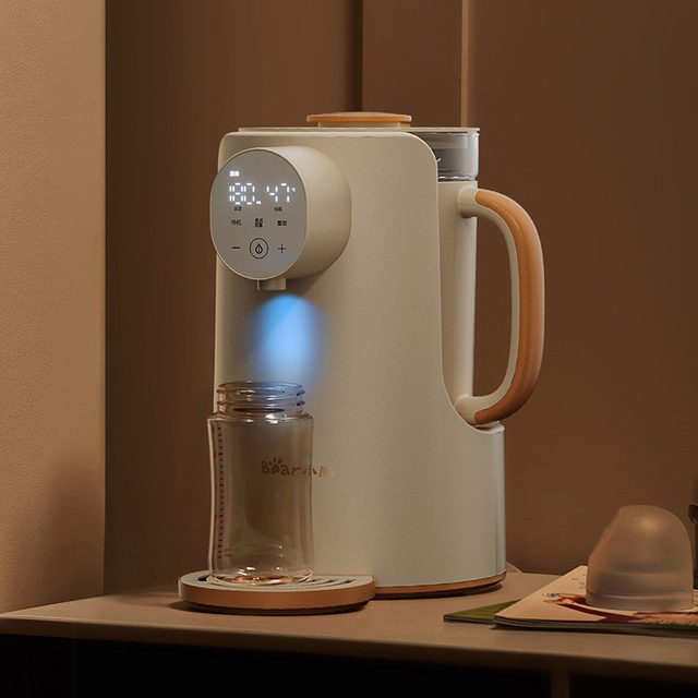 Dispenser pemanasan air segera untuk formula bayi